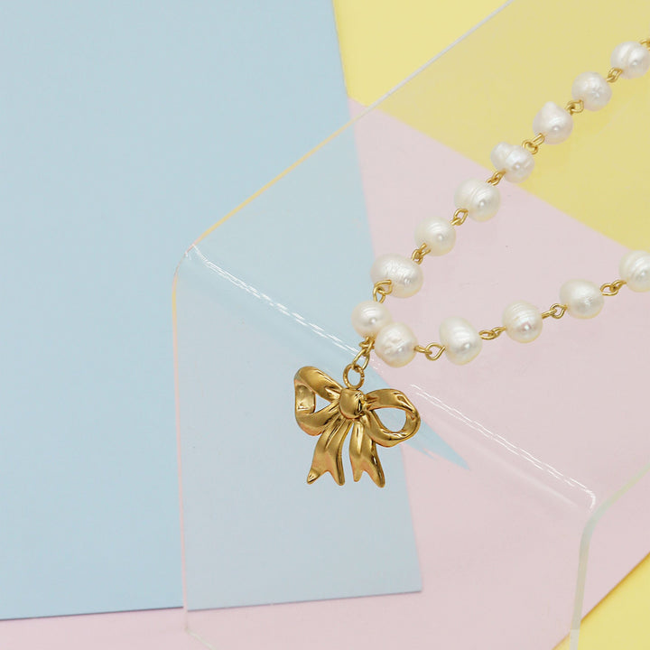 Lady Pearl X Bow Necklace