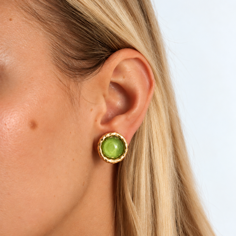 Apple Green Bezel Round Clip-On Earring worn showing sculpted circular setting and green glass