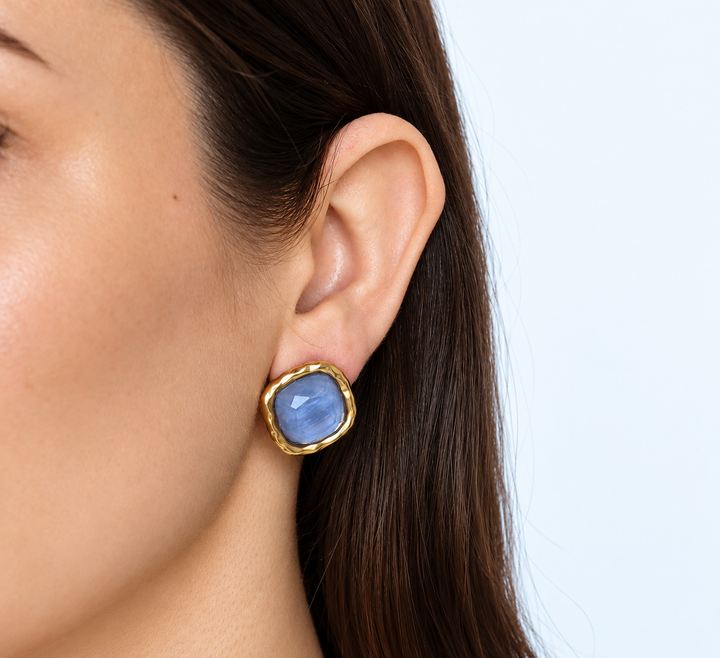 Square faceted blue gem stud bezel earring worm on model