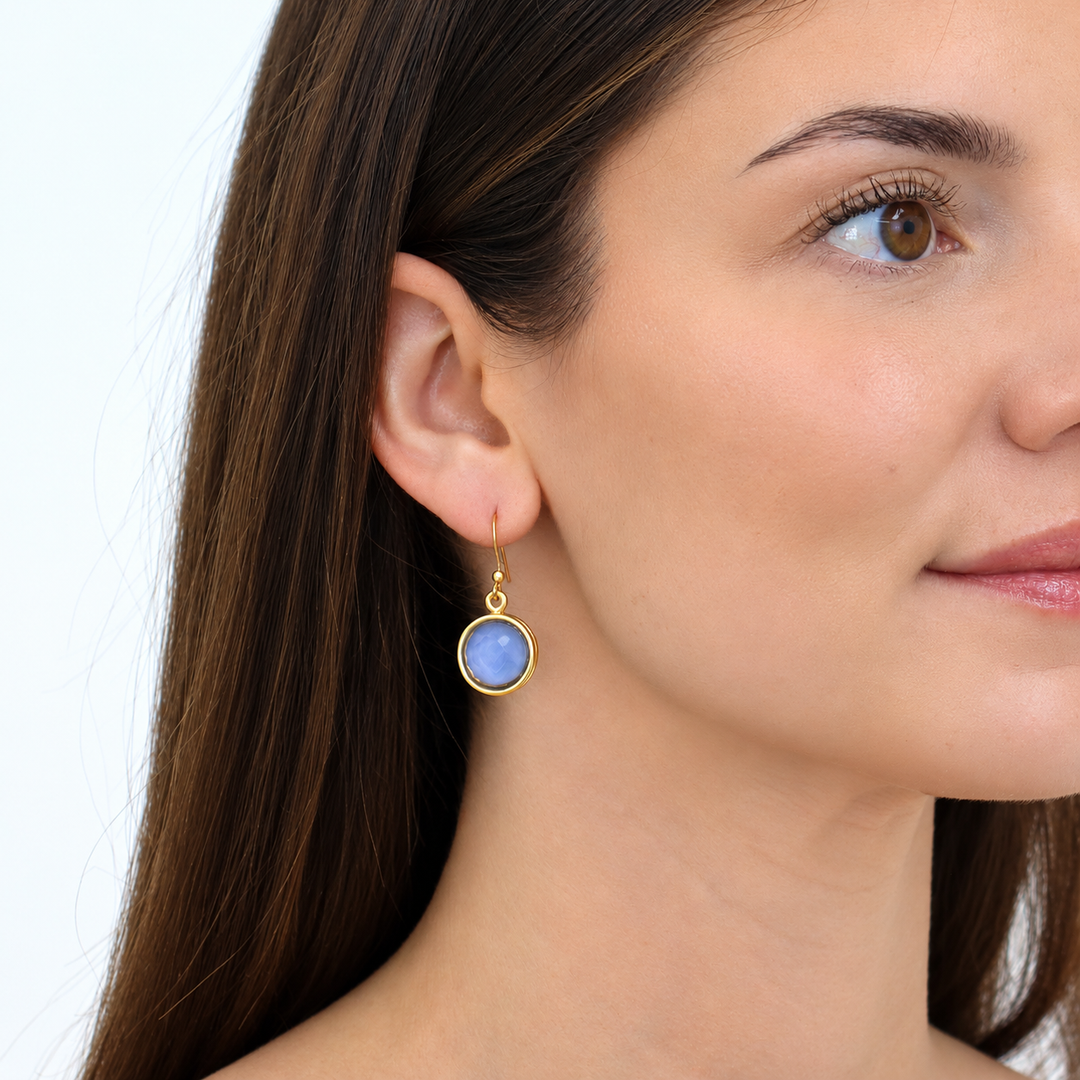 Soft Denim Blue Cabochon Dangle Earrings worn with delicate gold plated French wires
