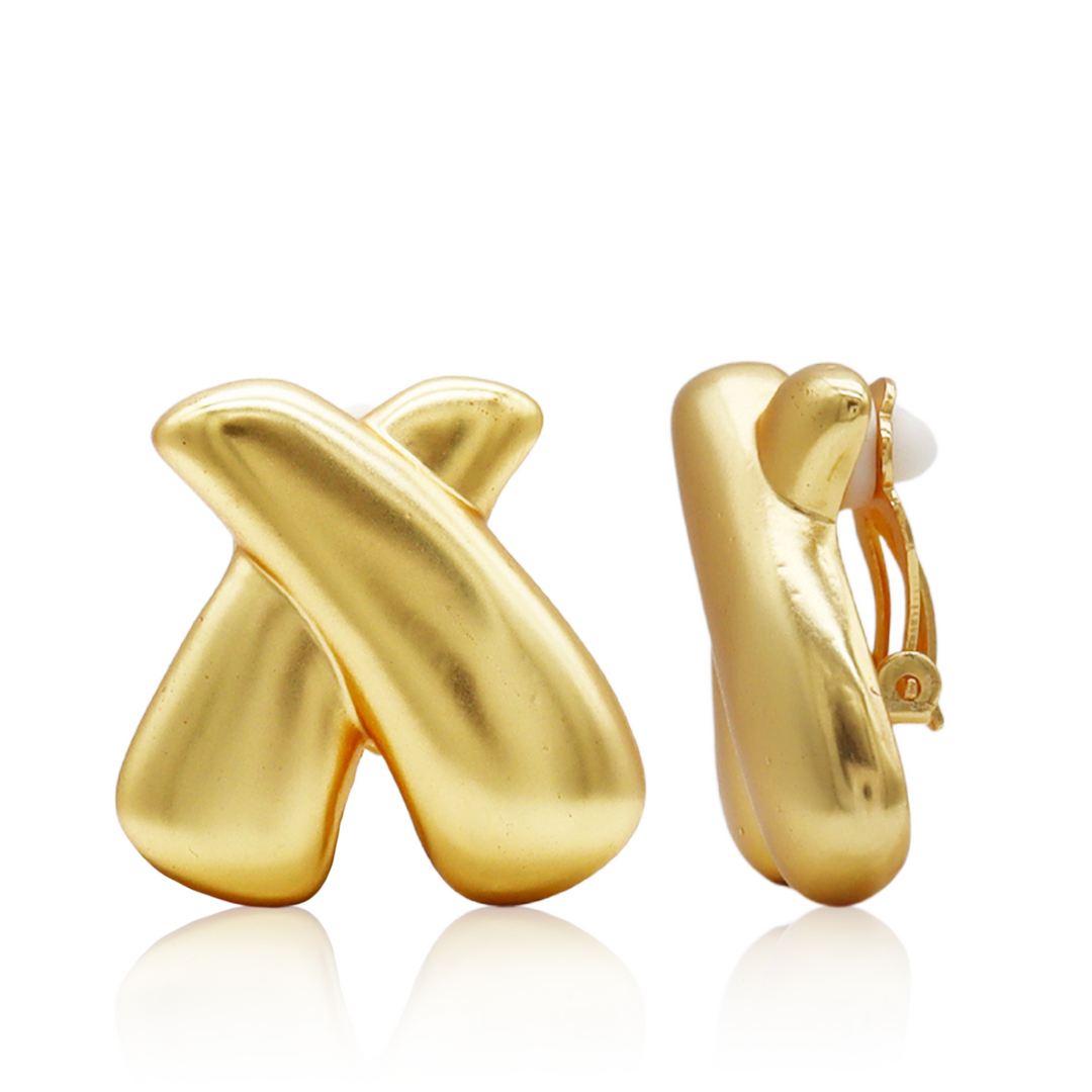 Crossed Clip-On Earrings with smooth intersecting gold plated curves and padded clip closure