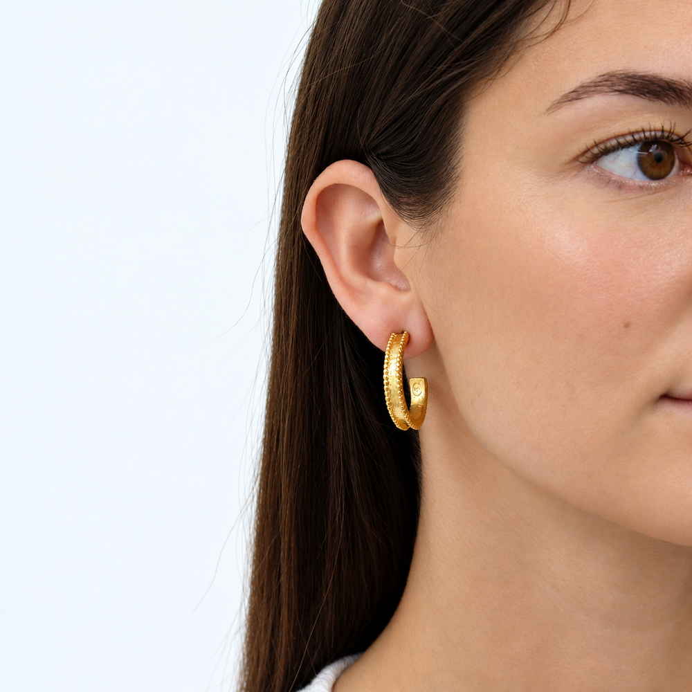 Dotty Hoop Earring worn on brunette model showing delicate raised dots along both edges