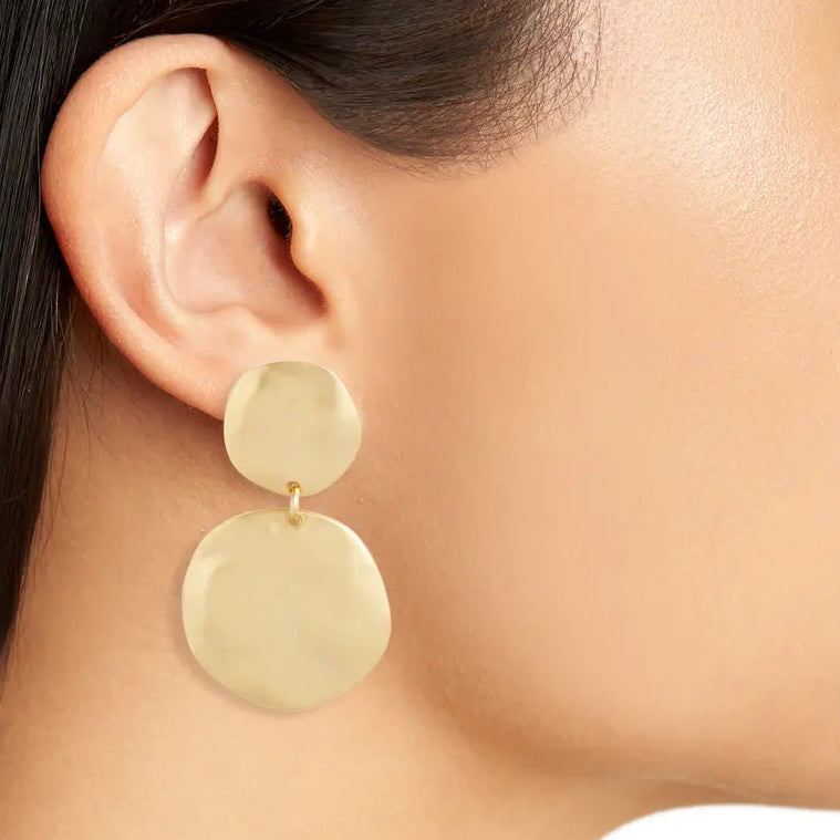 Gold Double Disc Clip-On Earrings worn close up showing softly hammered overlapping discs