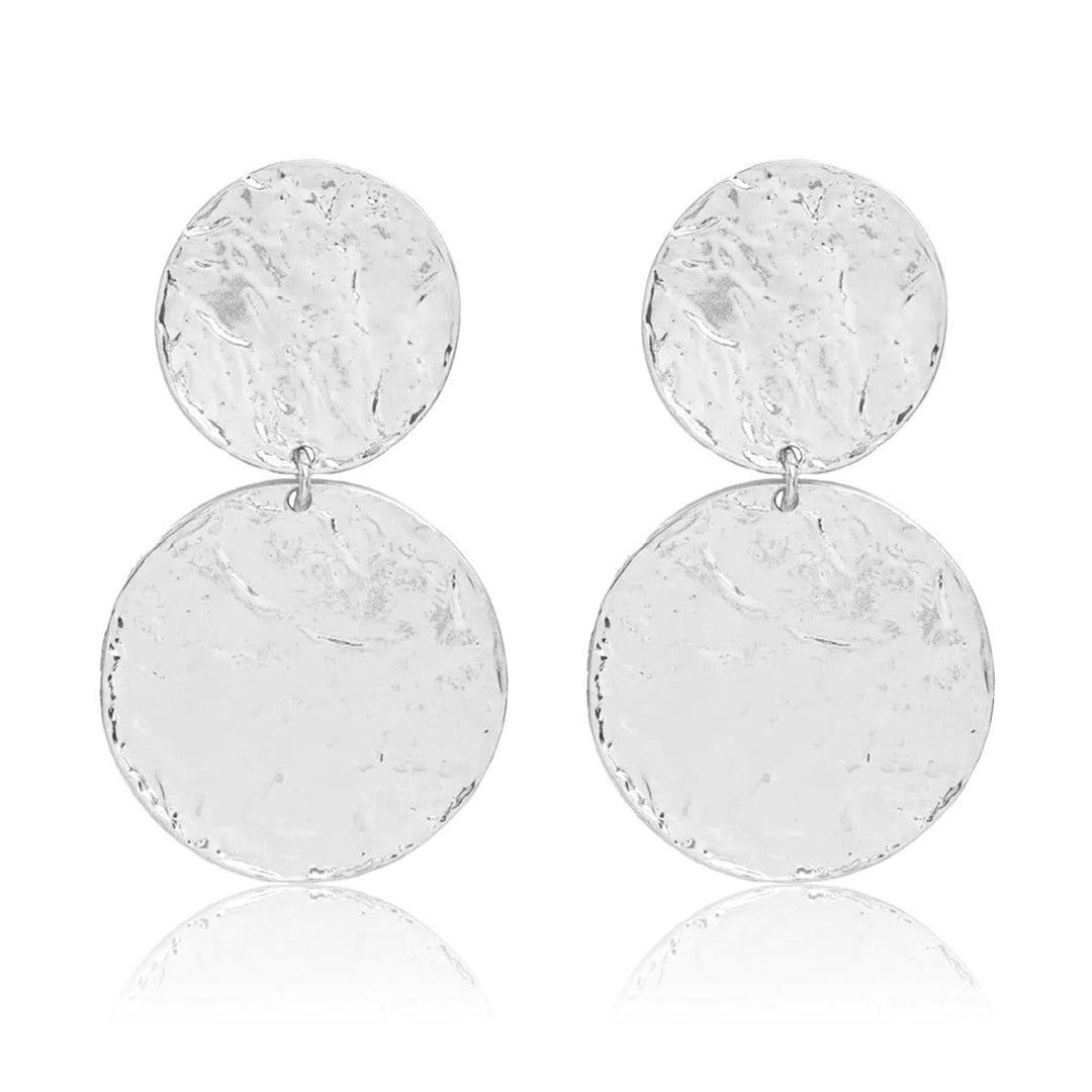 Silver Hammered Disc Statement Earrings with two softly irregular textured discs in graduated sizes