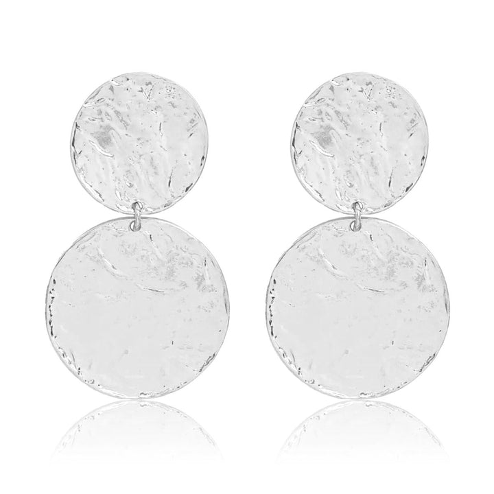 Silver Hammered Disc Statement Earrings with two softly irregular textured discs in graduated sizes