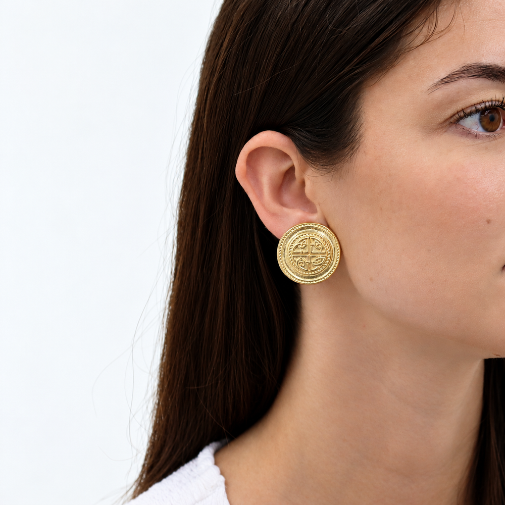 Heritage Medallion Clip-On Earrings worn on model showing round engraved design
