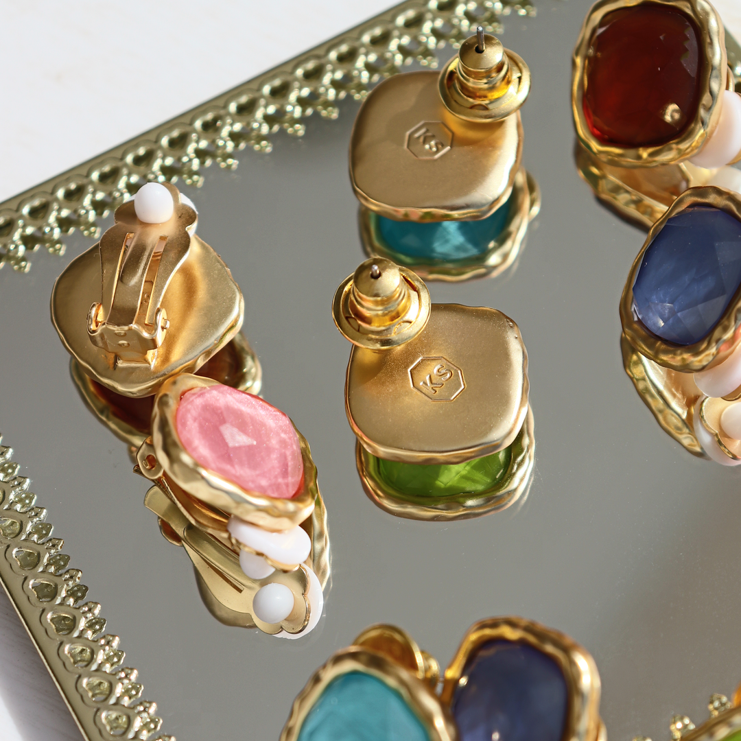 colorful stone jewelry on a miror