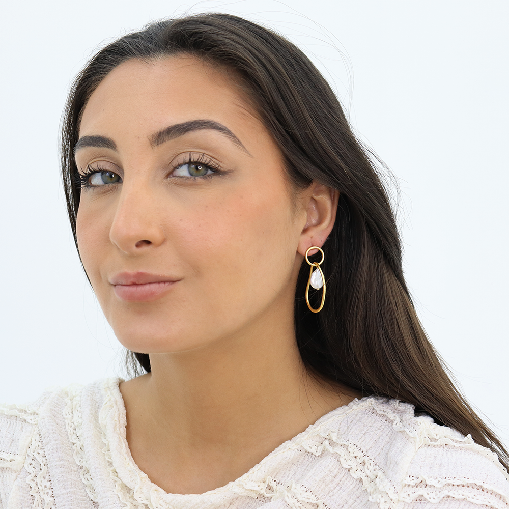 Organic Link Pearl Drop Earring worn on brunette model with white textured blouse