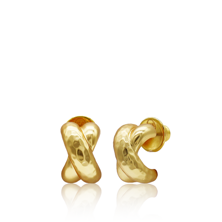 small hammered cross gold plated huggies mini hoop earrings by designer karine sultan