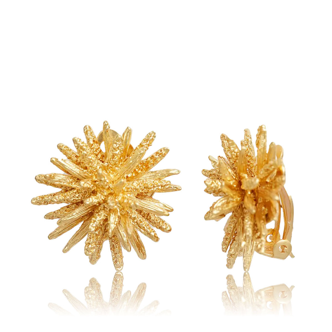 Gold Starburst Clip-On Earrings with textured coral-inspired rays and adjustable clip backs