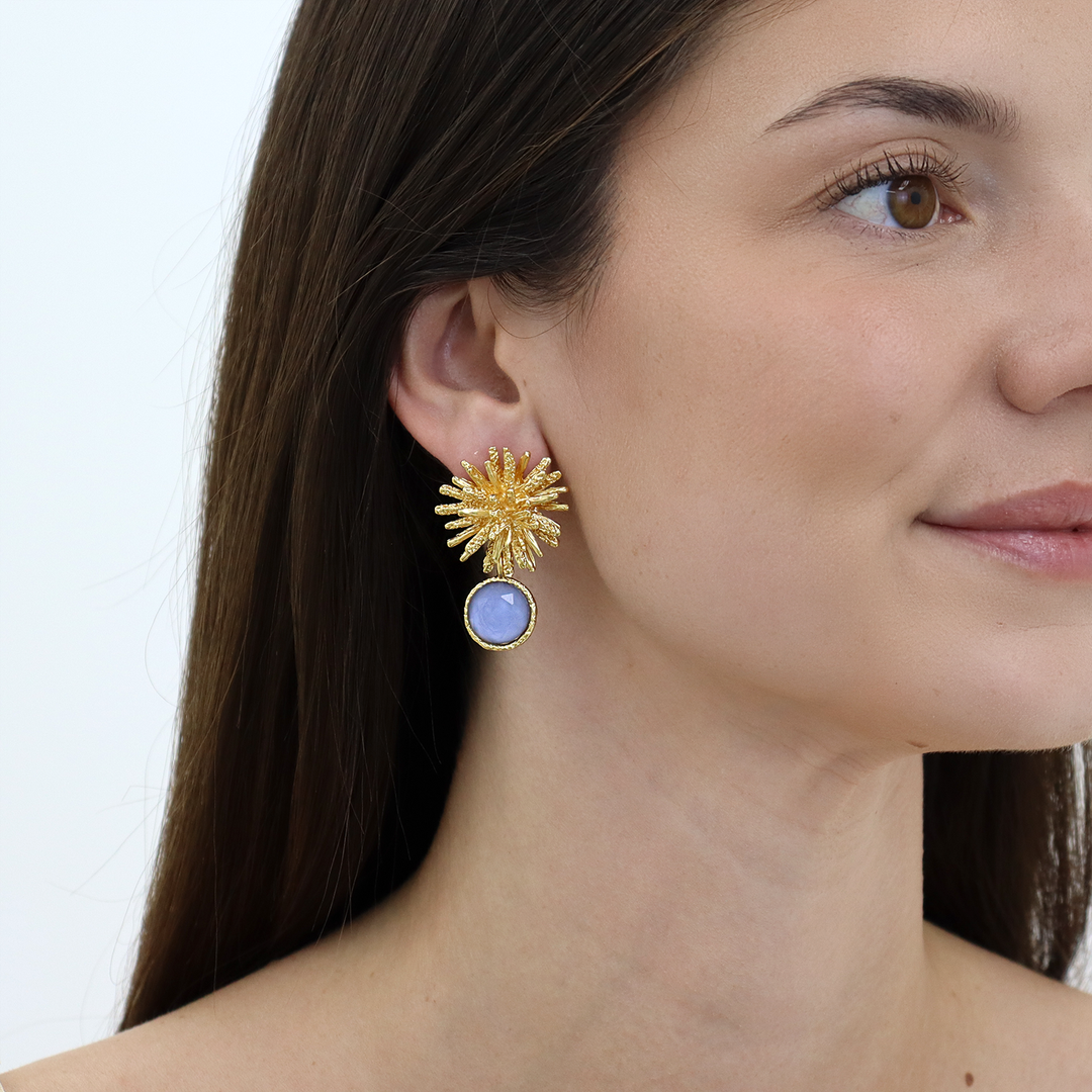 Soft Denim Blue Starburst Gem Drop Earrings worn on model