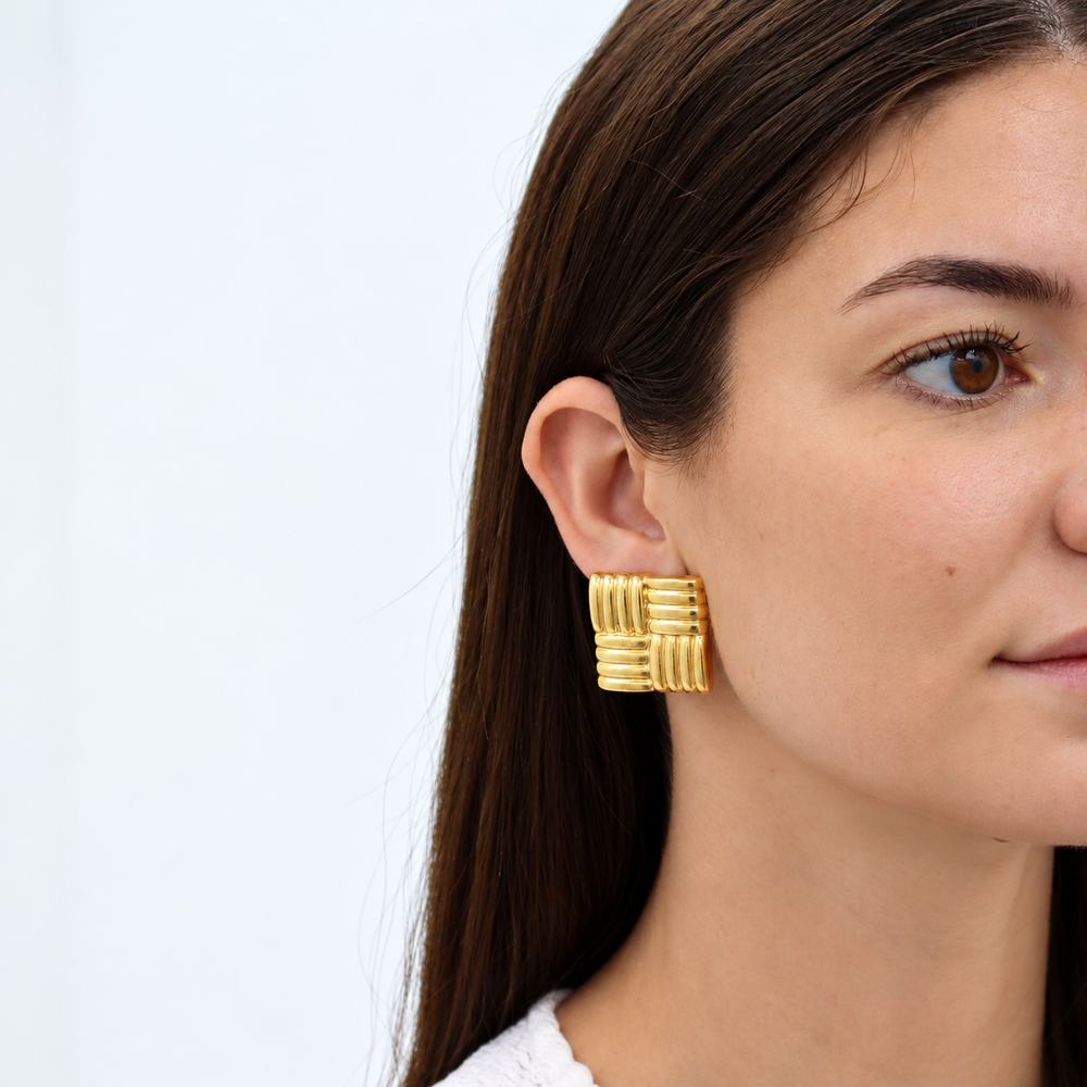 Woven Clip-On Earrings worn on ear showing square textured design