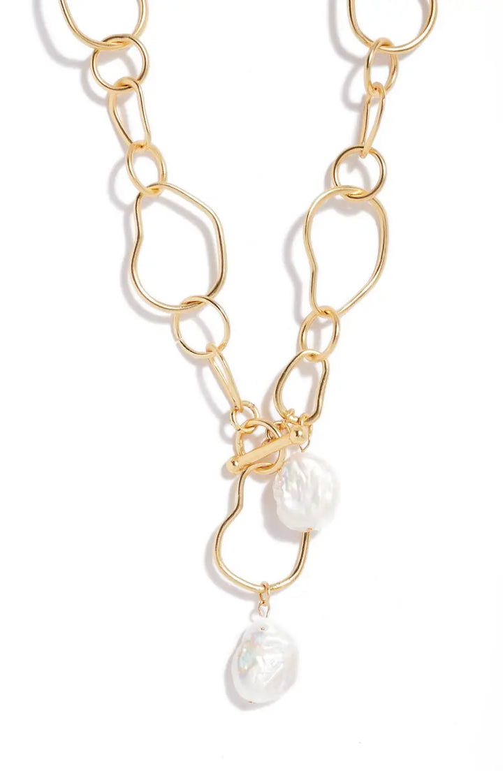 Organic link and flat pearl dangle necklace - Karine Sultan