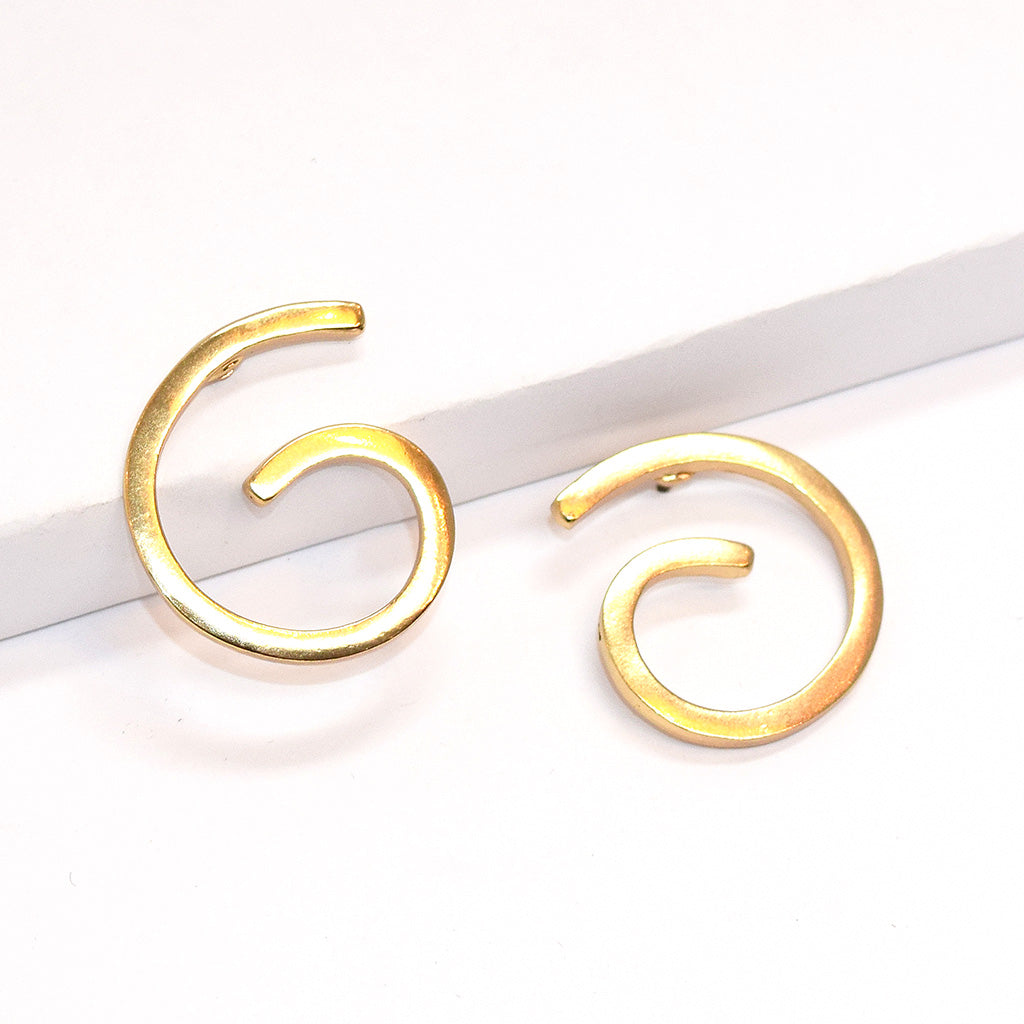 Large spiral stud earrings - Karine Sultan