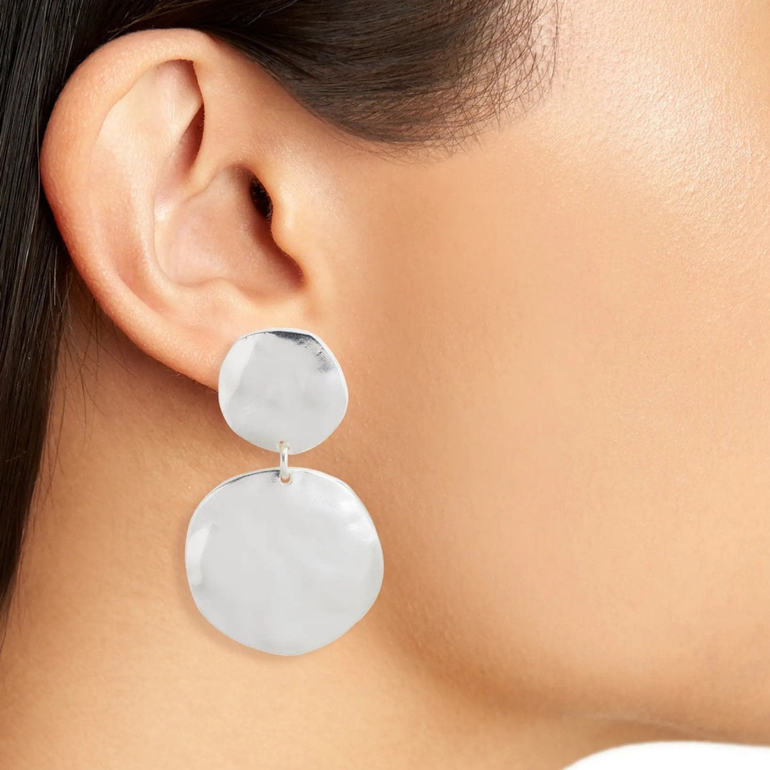 Silver Double Disc Clip-On Earrings worn close up showing two softly irregular discs
