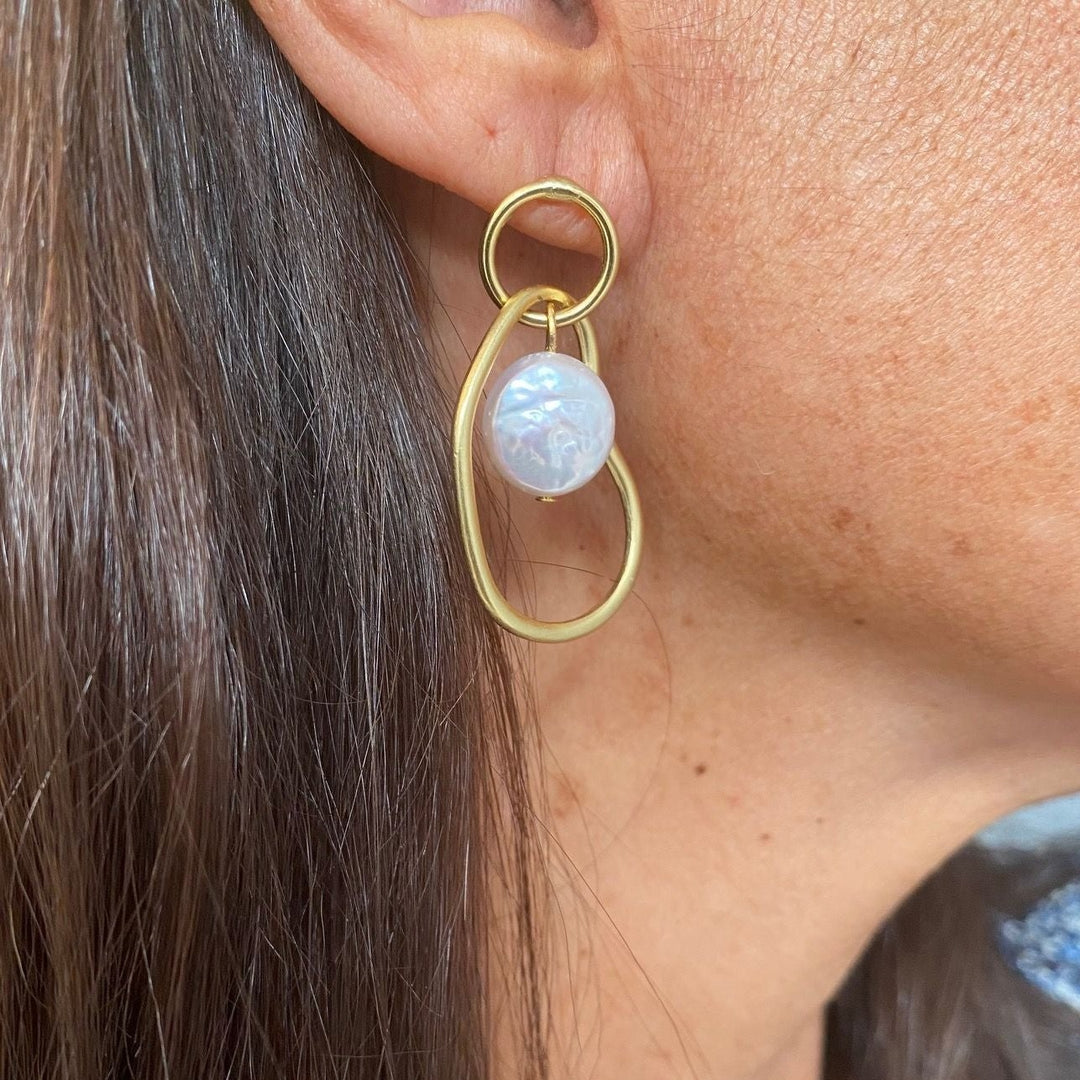 Organic Link Pearl Drop Earring worn close up showing iridescent freshwater pearl and gold links