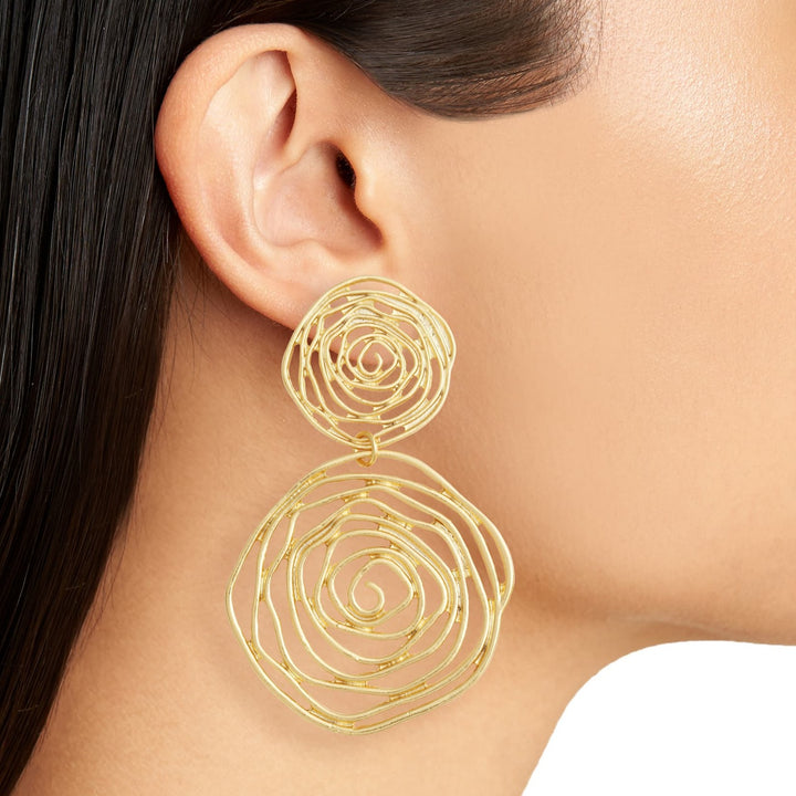 Gold Rose Cut Out Statement Earring worn close up showing intricate spiral rose petals